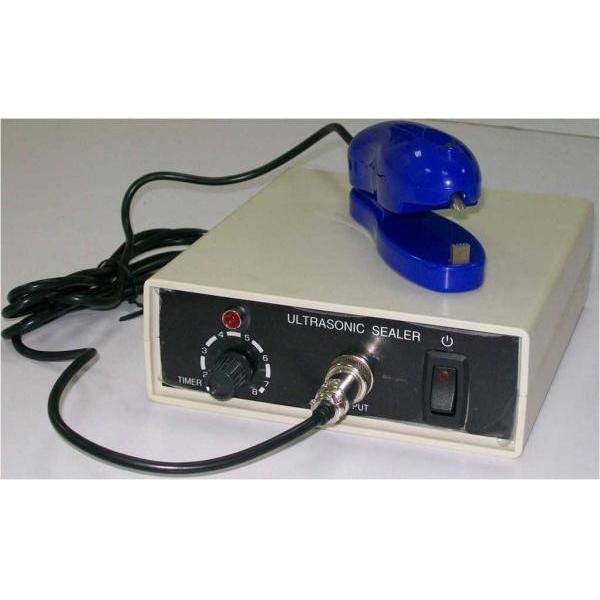 Ultrasonic clam shell sealer